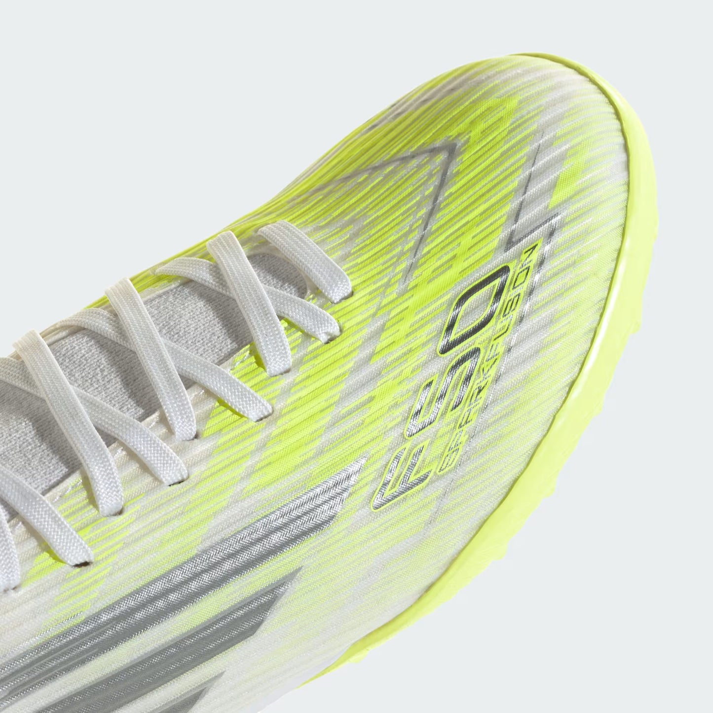 Zapatillas F50 SPARKFUSION LEAGUE de Corte Medio para Pasto Artificial para Mujer