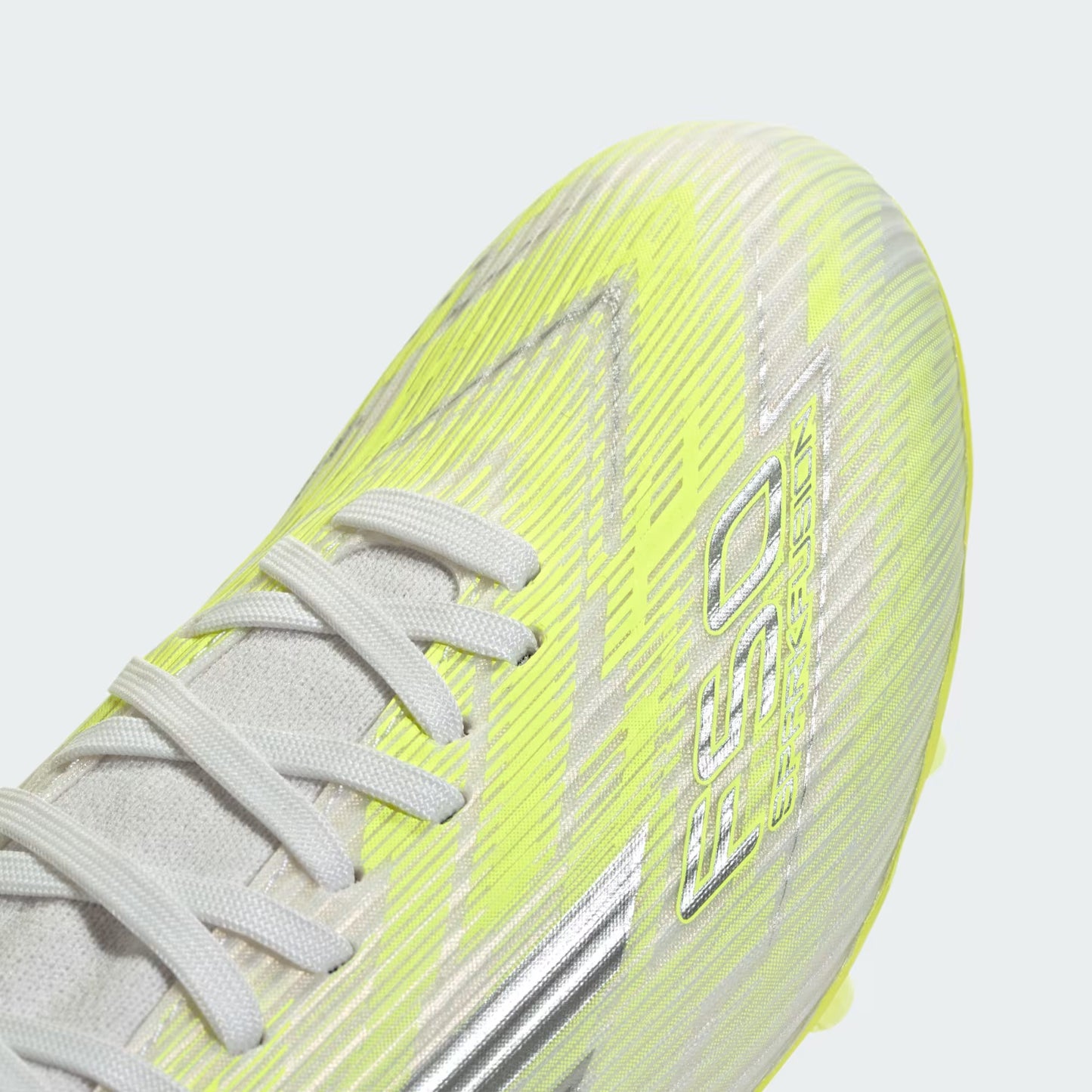 Chimpunes F50 SPARKFUSION LEAGUE de Corte Medio para Terreno Firme/Pasto Artificial para Mujer